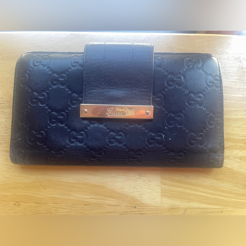 Authentic Gucci Black Embossed Leather Wallet